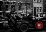 Image of Army M3 Half Track towing a field piece Belgium, 1944, second 13 stock footage video 65675044523