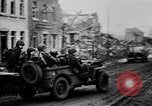Image of Army M3 Half Track towing a field piece Belgium, 1944, second 14 stock footage video 65675044523