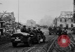 Image of Army M3 Half Track towing a field piece Belgium, 1944, second 16 stock footage video 65675044523