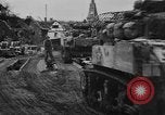 Image of Army M3 Half Track towing a field piece Belgium, 1944, second 18 stock footage video 65675044523