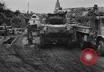Image of Army M3 Half Track towing a field piece Belgium, 1944, second 23 stock footage video 65675044523