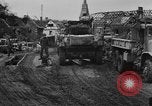 Image of Army M3 Half Track towing a field piece Belgium, 1944, second 24 stock footage video 65675044523