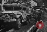 Image of Army M3 Half Track towing a field piece Belgium, 1944, second 27 stock footage video 65675044523