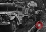 Image of Army M3 Half Track towing a field piece Belgium, 1944, second 28 stock footage video 65675044523