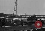 Image of Army M3 Half Track towing a field piece Belgium, 1944, second 56 stock footage video 65675044523