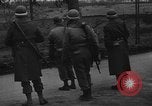 Image of Civilians fleeing Bastogne as German Forces advance toward the town Bastogne Belgium, 1944, second 9 stock footage video 65675044527