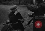 Image of Civilians fleeing Bastogne as German Forces advance toward the town Bastogne Belgium, 1944, second 29 stock footage video 65675044527