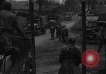 Image of Civilians fleeing Bastogne as German Forces advance toward the town Bastogne Belgium, 1944, second 32 stock footage video 65675044527