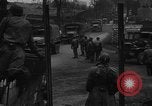 Image of Civilians fleeing Bastogne as German Forces advance toward the town Bastogne Belgium, 1944, second 33 stock footage video 65675044527