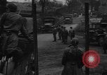 Image of Civilians fleeing Bastogne as German Forces advance toward the town Bastogne Belgium, 1944, second 34 stock footage video 65675044527