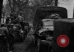 Image of Civilians fleeing Bastogne as German Forces advance toward the town Bastogne Belgium, 1944, second 38 stock footage video 65675044527