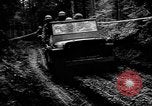 Image Des soldats américains chargent des camions Aix-la-Chapelle en Allemagne, 1944, de la seconde 37 séquences d'archives historiques vidéo 65675044562