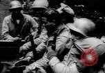 Image Des soldats américains chargent des camions Aix-la-Chapelle en Allemagne, 1944, de la seconde 62 séquences d'archives historiques vidéo 65675044562