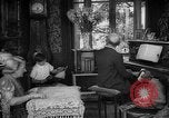 Image of family listening to radio broadcast Paris France, 1950, second 6 stock footage video 65675044610