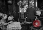 Image of family listening to radio broadcast Paris France, 1950, second 8 stock footage video 65675044610