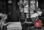 Image of family listening to radio broadcast Paris France, 1950, second 13 stock footage video 65675044610