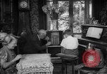 Image of family listening to radio broadcast Paris France, 1950, second 19 stock footage video 65675044610