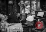 Image of family listening to radio broadcast Paris France, 1950, second 23 stock footage video 65675044610