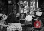 Image of family listening to radio broadcast Paris France, 1950, second 24 stock footage video 65675044610