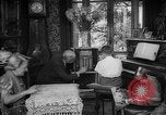 Image of family listening to radio broadcast Paris France, 1950, second 25 stock footage video 65675044610