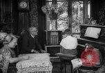 Image of family listening to radio broadcast Paris France, 1950, second 33 stock footage video 65675044610