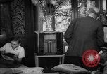 Image of family listening to radio broadcast Paris France, 1950, second 41 stock footage video 65675044610