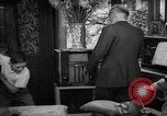 Image of family listening to radio broadcast Paris France, 1950, second 42 stock footage video 65675044610