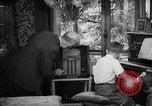 Image of family listening to radio broadcast Paris France, 1950, second 47 stock footage video 65675044610