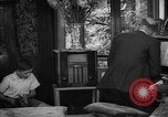 Image of family listening to radio broadcast Paris France, 1950, second 58 stock footage video 65675044610