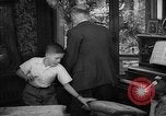 Image of family listening to radio broadcast Paris France, 1950, second 60 stock footage video 65675044610