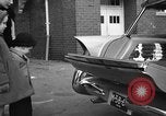 Standbild 1956 Chrysler Plymouth Plainsman Kombi Auto von Ghia Chicago Illinois USA, 1956, aus Sekunde 24 historischem Filmmaterial Videoclip 65675044718