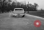 Standbild 1956 Chrysler Plymouth Plainsman Kombi Auto von Ghia Chicago Illinois USA, 1956, aus Sekunde 60 historischem Filmmaterial Videoclip 65675044718