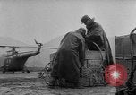 Image of helicopters lift supplies Korea, 1953, second 50 stock footage video 65675044739