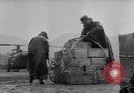 Image of helicopters lift supplies Korea, 1953, second 52 stock footage video 65675044739