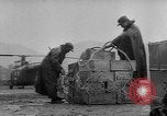 Image of helicopters lift supplies Korea, 1953, second 53 stock footage video 65675044739