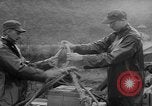 Image of helicopters lift supplies Korea, 1953, second 54 stock footage video 65675044739