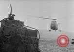 Image of helicopters lift supplies Korea, 1953, second 56 stock footage video 65675044739