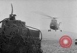 Image of helicopters lift supplies Korea, 1953, second 57 stock footage video 65675044739