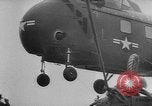 Image of helicopters lift supplies Korea, 1953, second 59 stock footage video 65675044739