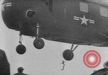 Image of helicopters lift supplies Korea, 1953, second 60 stock footage video 65675044739