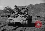 Image of US Army M4 Sherman tanks in Korean War Korea, 1952, second 32 stock footage video 65675044764