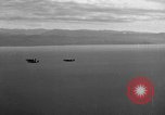 Standbild Hopoi Invasion Hopoi New Guinea, 1943, aus Sekunde 11 historischem Filmmaterial Videoclip 65675044784