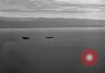 Standbild Hopoi Invasion Hopoi New Guinea, 1943, aus Sekunde 13 historischem Filmmaterial Videoclip 65675044784