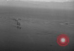 Standbild Hopoi Invasion Hopoi New Guinea, 1943, aus Sekunde 53 historischem Filmmaterial Videoclip 65675044784