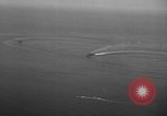 Standbild Hopoi Invasion Hopoi New Guinea, 1943, aus Sekunde 57 historischem Filmmaterial Videoclip 65675044784