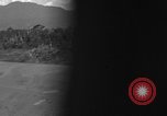 Standbild Douglas C-47 Skytrain Nadzab New Guinea, 1943, aus Sekunde 12 historischem Filmmaterial Videoclip 65675044787