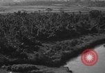 Standbild Douglas C-47 Skytrain Nadzab New Guinea, 1943, aus Sekunde 23 historischem Filmmaterial Videoclip 65675044787