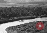 Standbild Douglas C-47 Skytrain Nadzab New Guinea, 1943, aus Sekunde 26 historischem Filmmaterial Videoclip 65675044787