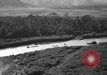 Standbild Douglas C-47 Skytrain Nadzab New Guinea, 1943, aus Sekunde 27 historischem Filmmaterial Videoclip 65675044787