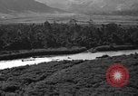 Standbild Douglas C-47 Skytrain Nadzab New Guinea, 1943, aus Sekunde 28 historischem Filmmaterial Videoclip 65675044787